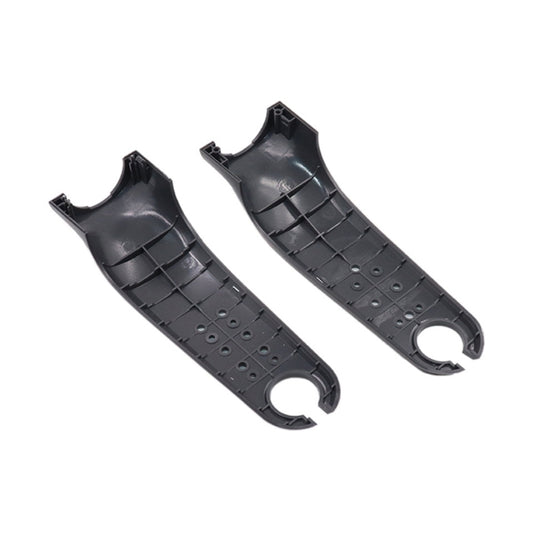 Set of two black plastic front fork covers with vent holes and cutouts