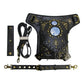 Black crossbody pouch with blue gem panel, studded details, and included strap hardware