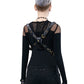 Black crossbody bag worn at back with adjustable straps and metallic buckles