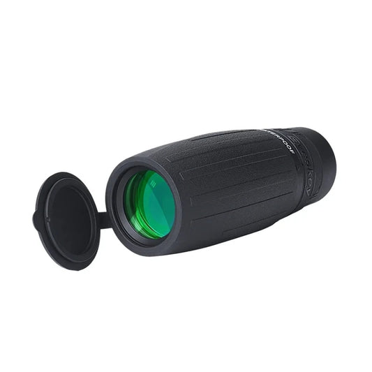 Black monocular with lens cap and green objective lens