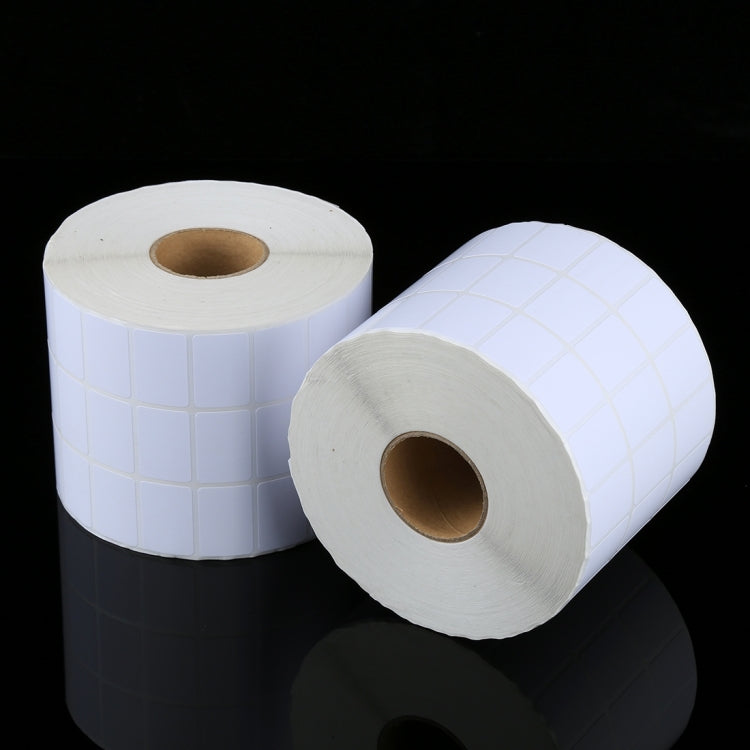Two rolls of white 20x30 mm label stickers on paper cores