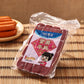 Transparent vacuum sealing bag holding a packaged food item, clear plastic pouch