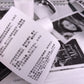 Thermal label printer paper sticker sheet roll, close-up of printed text