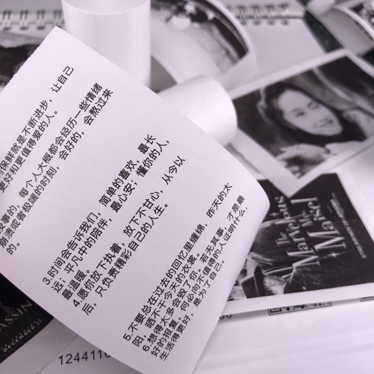 Thermal label printer paper sticker sheet roll, close-up of printed text