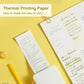 Thermal printing paper roll near clipped printed receipts