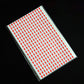 Rectangle self-adhesive arrow label sheet with red up-arrow pattern on white