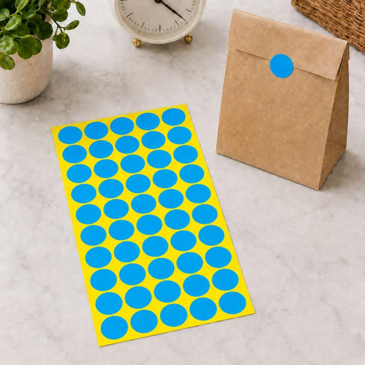 Round self-adhesive sticker labels sheet with blue circular dots