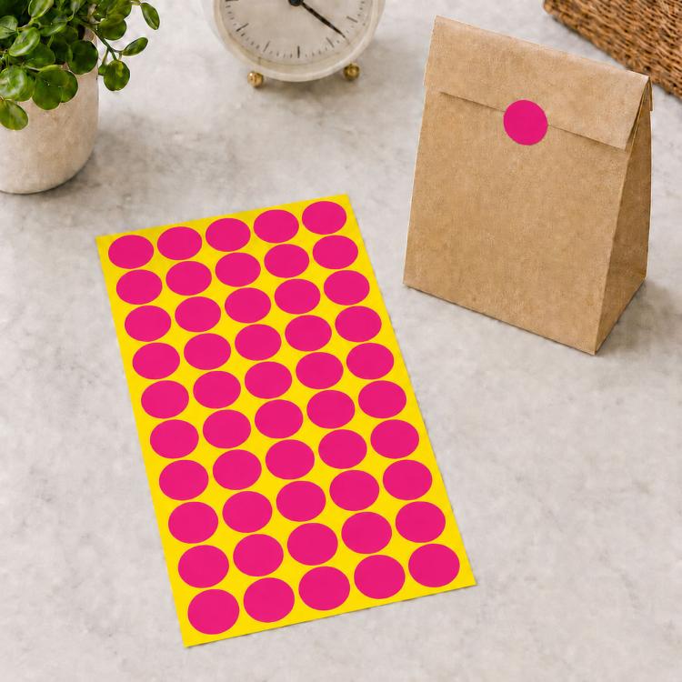 Round self-adhesive sticker labels sheet with pink circular dots