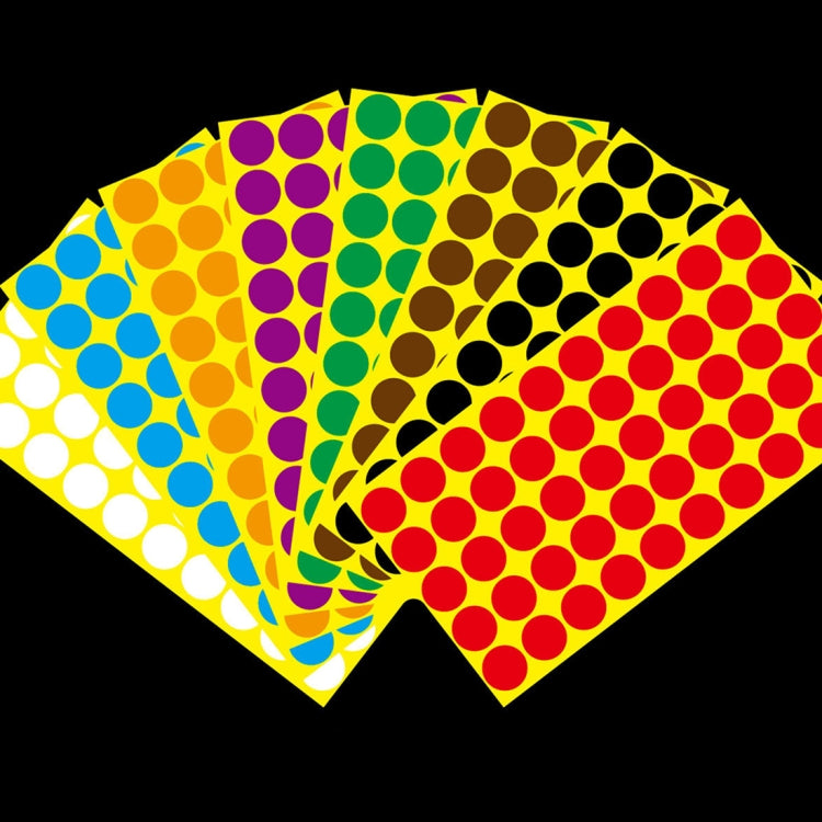 Round self-adhesive dot sticker sheets in mixed colors, stacked together
