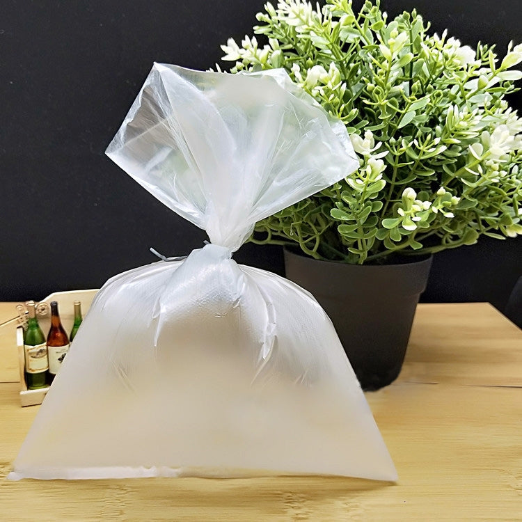 Clear PE packaging bag with gathered top, used for storage or shipping, 50 x 60 cm