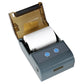 Portable thermal receipt printer with open top compartment and white paper roll