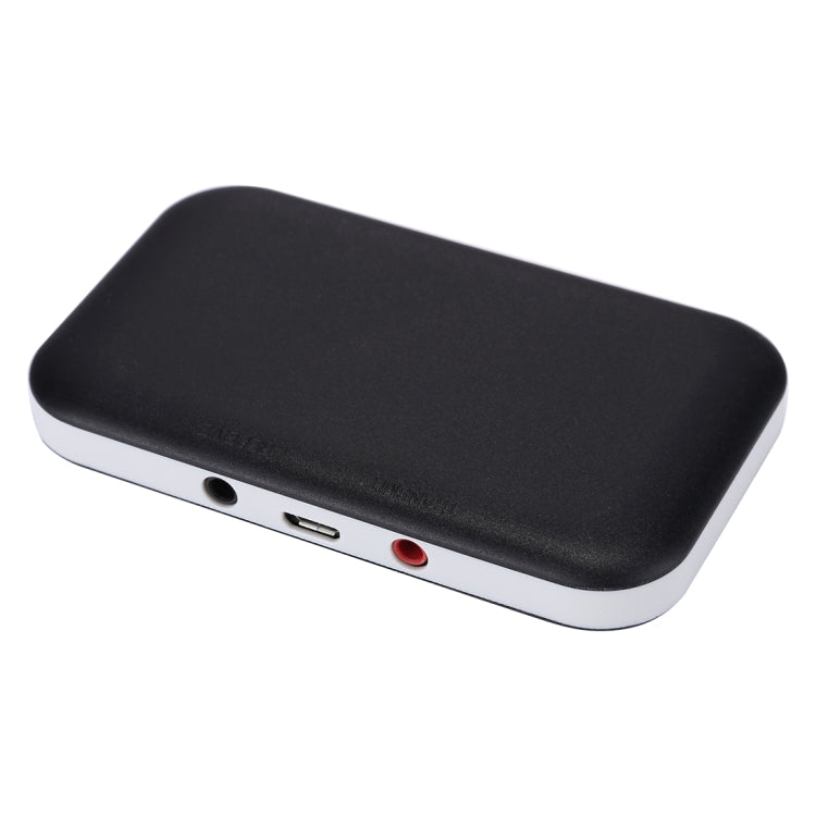 Black Bluetooth audio adapter showing side ports and red/green indicator lights