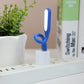 Blue flexible USB LED reading light on, illuminated oval light head on base