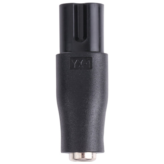 Black shaver-interface connector with metal center pin and rubber-grip body