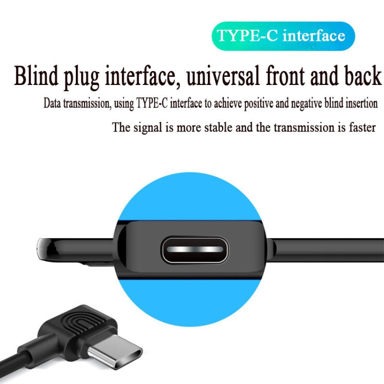 Type-C port on black drawing tablet with cable ends, close-up
