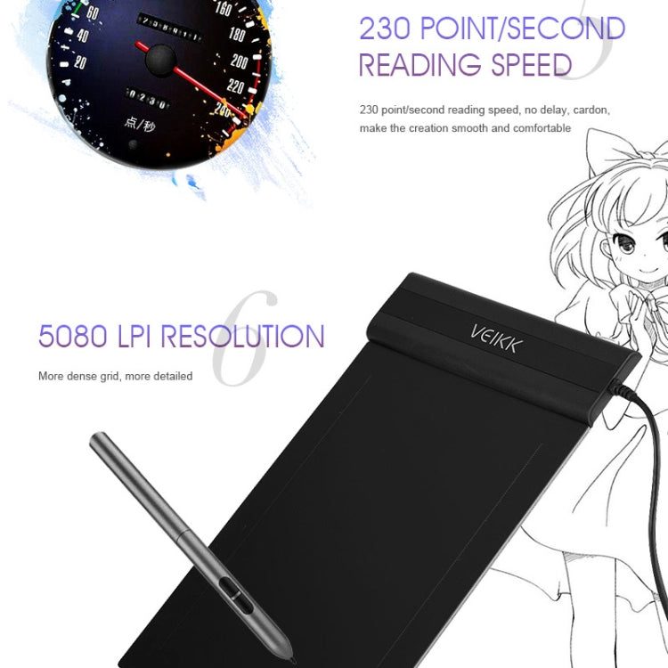 Black electronic graphic tablet with stylus pen and cable connection