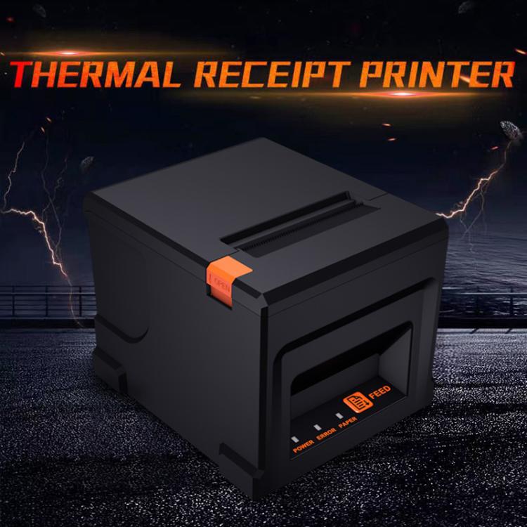 Black thermal receipt printer with orange latch and top paper slot, rugged desktop design.