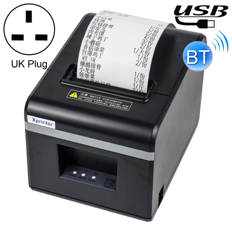 Black thermal receipt printer with paper window and Bluetooth indicator, UK plug shown.