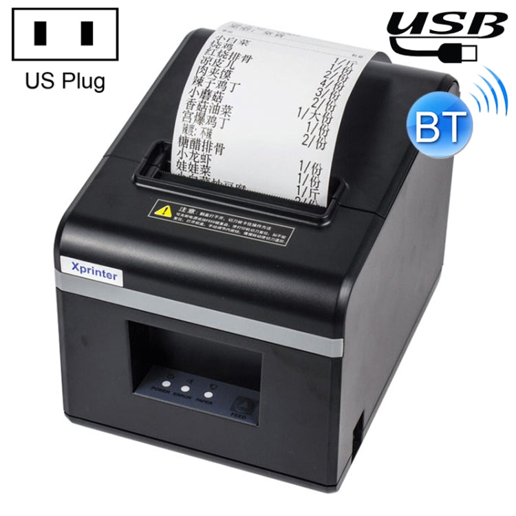 Black thermal receipt printer with paper window and Bluetooth indicator, US plug shown.
