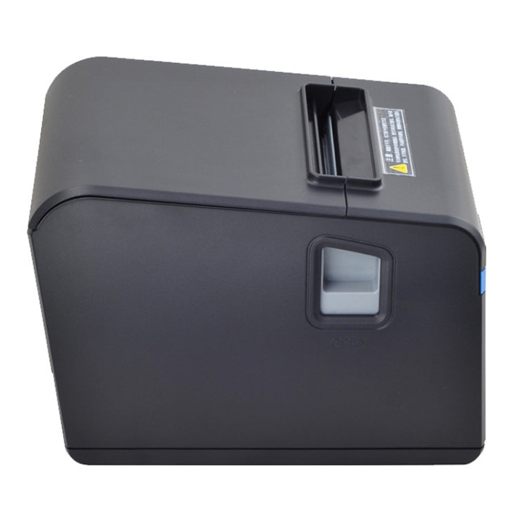 Thermal barcode printer rear side with paper exit opening and label area, dark gray body