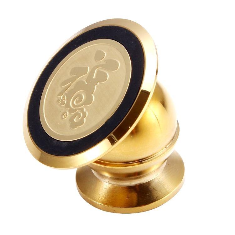Gold metal circular knob with engraved emblem and black inset on a base