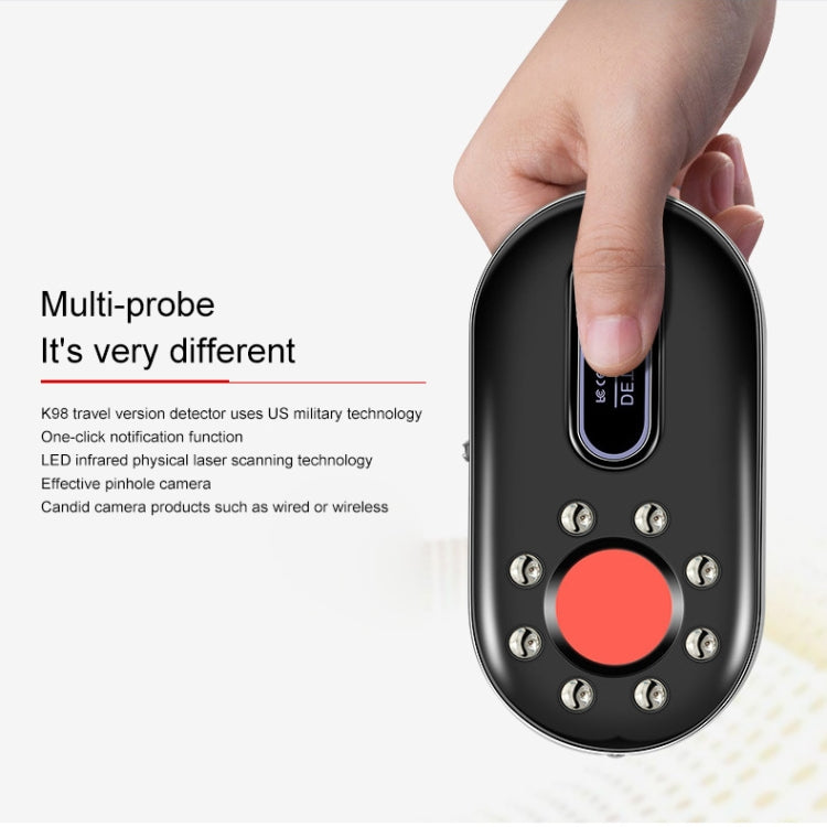 Handheld vibration alarm key fob with red button, speaker grille, and back switch