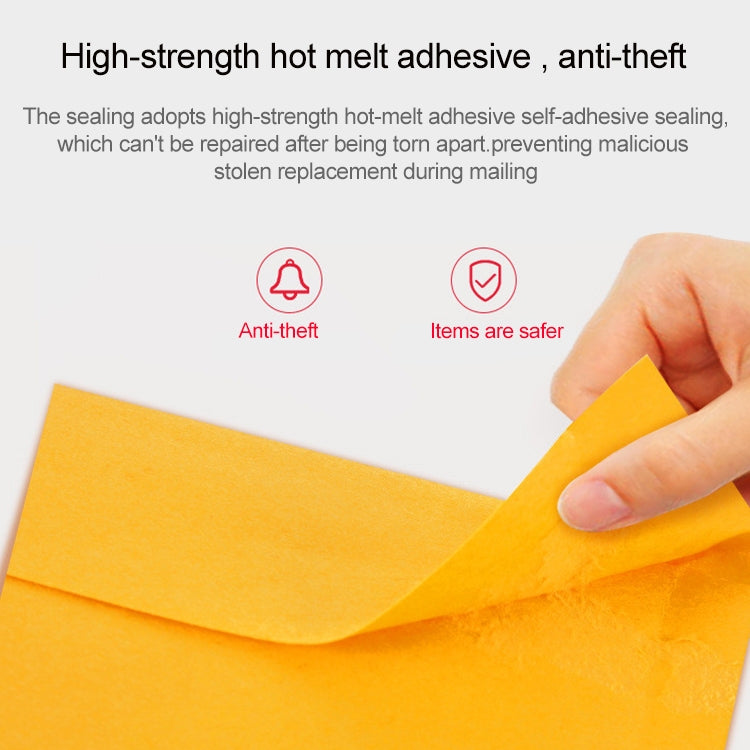 Orange kraft paper bubble mailer envelope being sealed with adhesive flap by a hand
