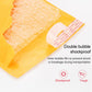 Orange kraft paper mailer with white double-bubble cushioning layer and red label strip