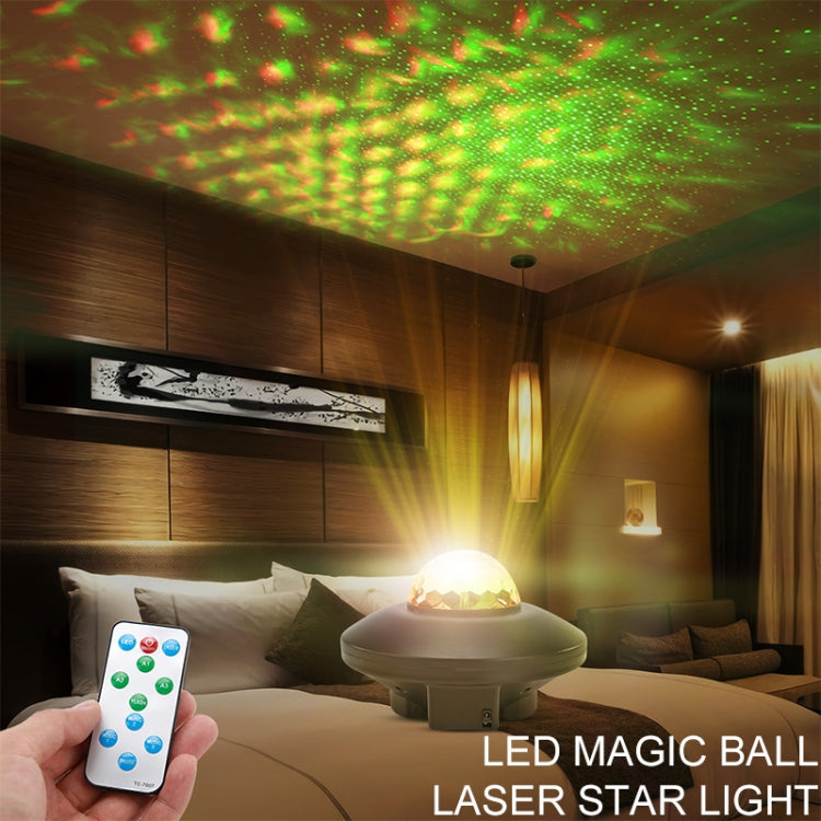 Black dome laser star projector light on a bedside table with Bluetooth remote