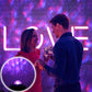 Small blue dome projector light with remote, creating glowing laser patterns