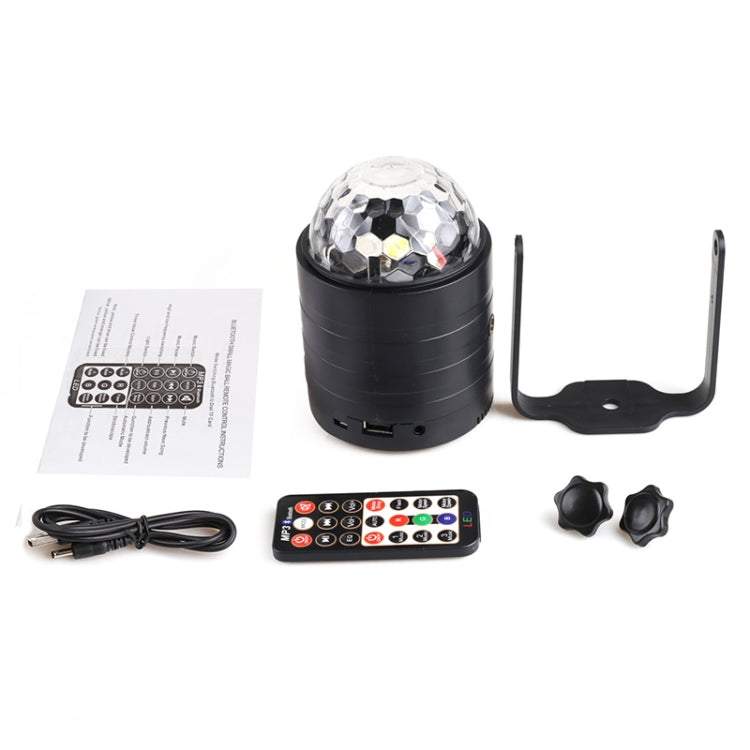 Black crystal magic ball stage light with remote, cables, and mounting bracket