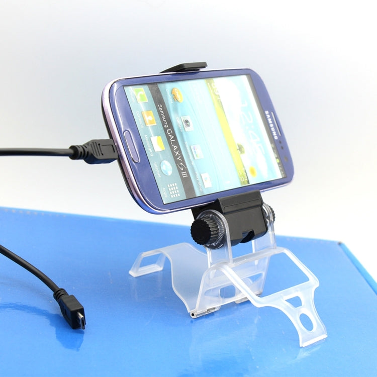 Mobile phone clamp holder with phone mounted and charging cable attached