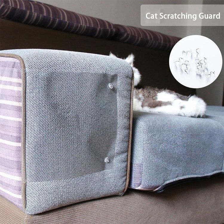 Clear PVC scratch guard panel on sofa armrest, cat playing beside it