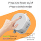 Auto pet toy ball base with a hand pressing the switch for power and modes