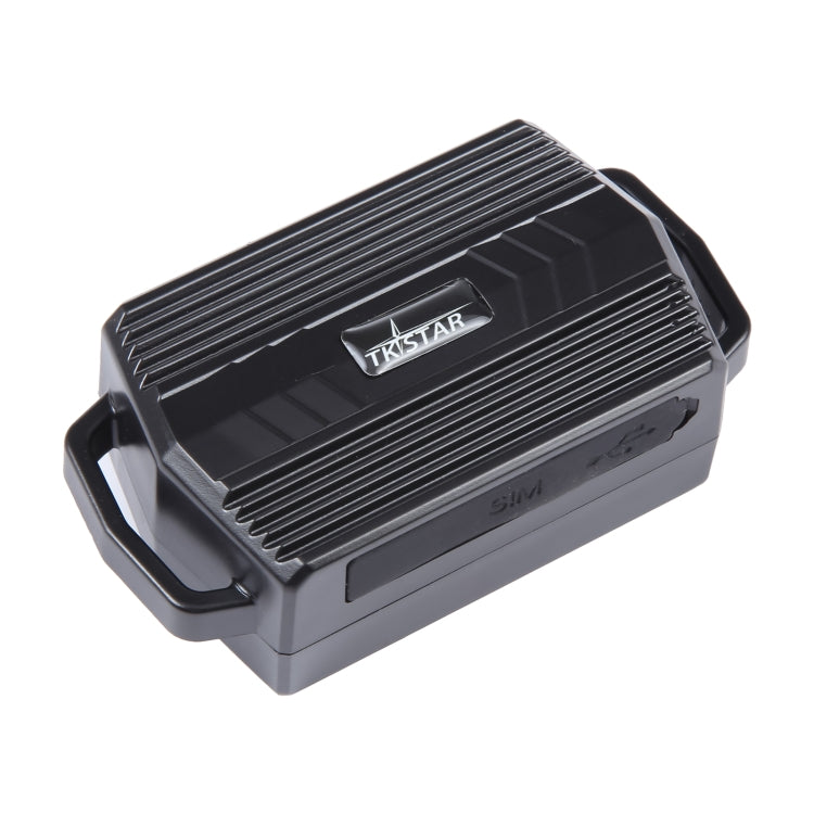 Black TKSTAR GPS tracker unit with ribbed top and carry handle, close-up front view