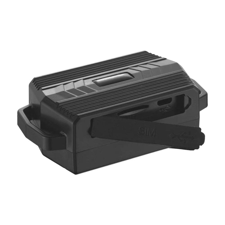 Black GPS tracker device with side ports and molded housing, angled close-up