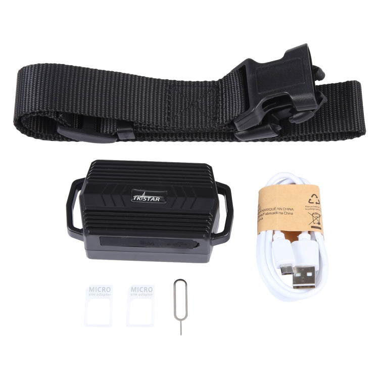 GPS pet tracker with adjustable fabric strap, charger cable, and accessory parts