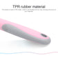 TPR-style dog comb handle with pink grip panel, gray body, and rounded end cap