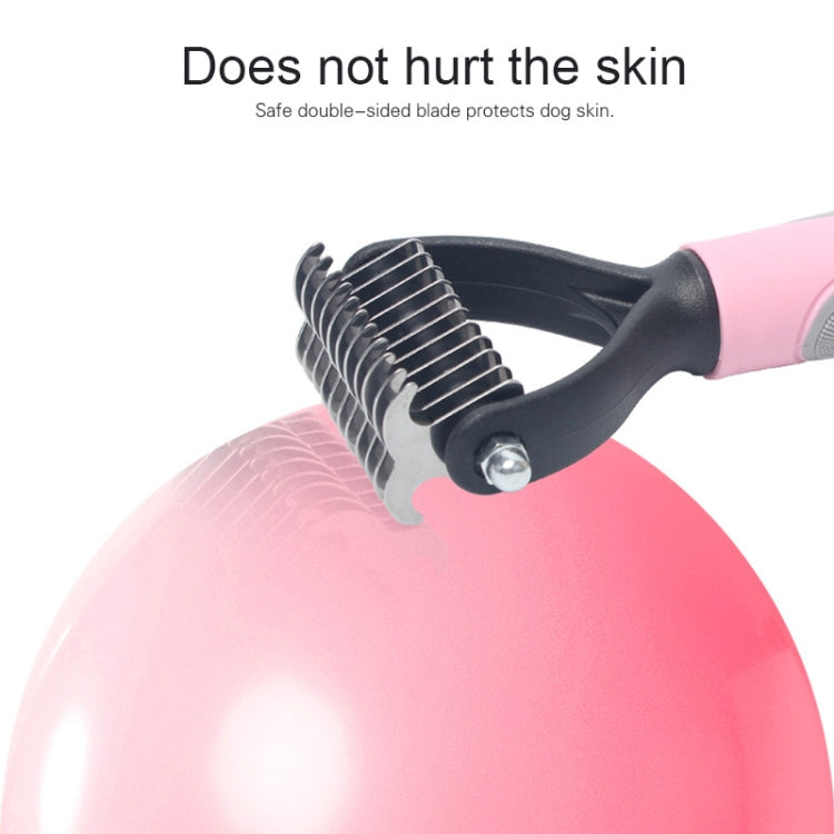 Dog comb with stainless steel teeth and pink handle shown at grooming angle