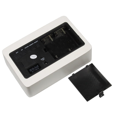 White wooden digital clock showing open back panel with controls and screen
