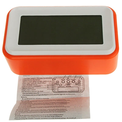 Orange multi-function alarm clock bottom with regulatory label and power info