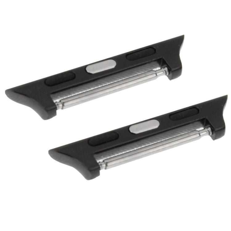 Black metal Apple Watch strap connectors with exposed silver spring bars