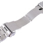 Close-up of stainless steel watch band clasp with fastening pin and hole detail