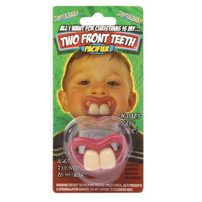 Two front teeth pacifier in green blister package with baby smile graphic
