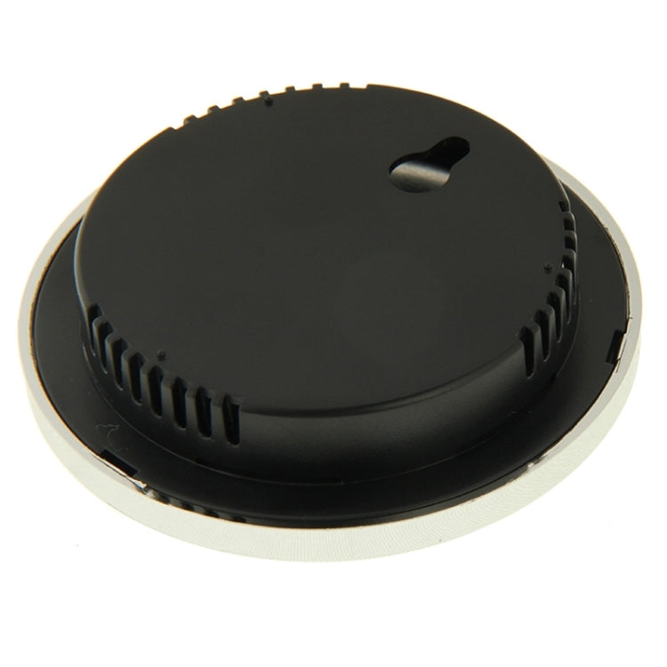 Black rear cover of round indoor thermometer and hygrometer with mounting holes