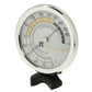 Indoor thermometer and hygrometer gauge with white dial, chrome rim, and black base