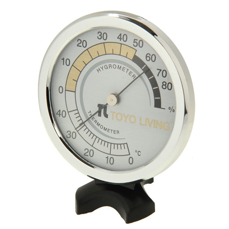 Indoor thermometer and hygrometer gauge with white dial, chrome rim, and black base