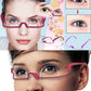 Double eyelid trainer glasses with pink frame on face, eye area shown