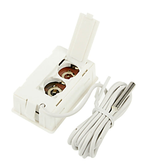 White indoor LCD thermometer sensor unit with battery contacts and attached wiring