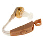 Beige behind-the-ear voice amplifier with clear tube, gold ring, and volume markings